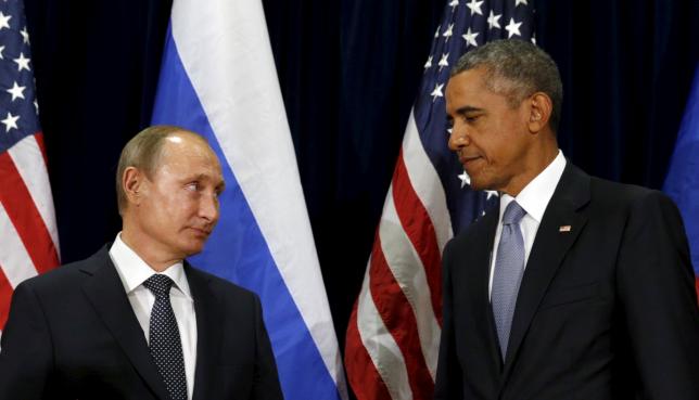 U.S. President Barack Obama and Russian President Vladimir Putin look towards one another during their meeting at the United Nations General Assembly in New York September 28, 2015. REUTERS/Kevin Lamarque